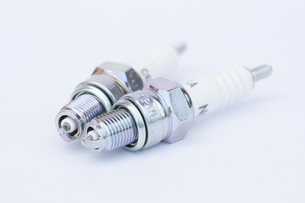 Two spark plugs with clean threads and sharp printing, the details to check when buying genuine spark plugs in Kenya